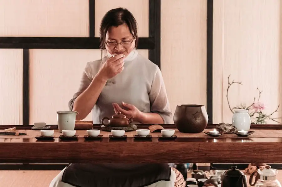 chinese woman taking tea