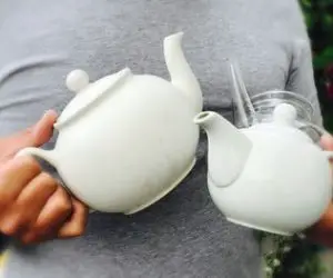me holding teapots
